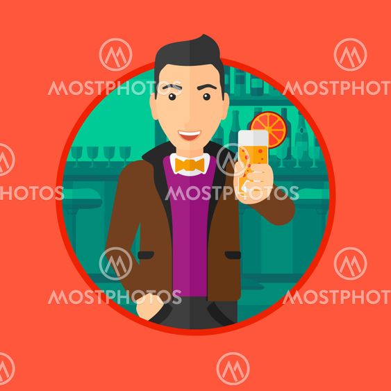 Man drinking orange cocktail at the bar.