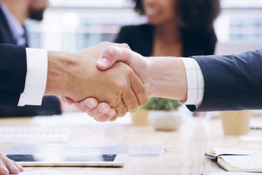 Closeup, handshake and business people in office,...