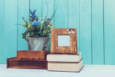 Shabby chic style home decorations on wooden background