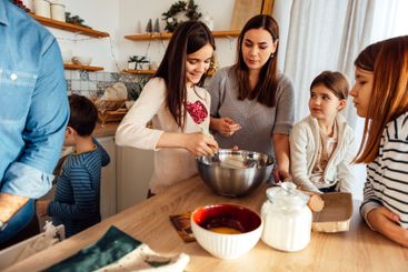 Cooking a festive dinner with the whole family in the...