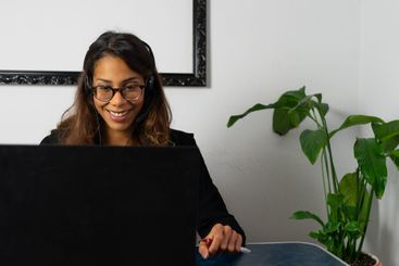 Portrait of afro american woman working from home