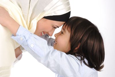 Muslim mother and son loving each other