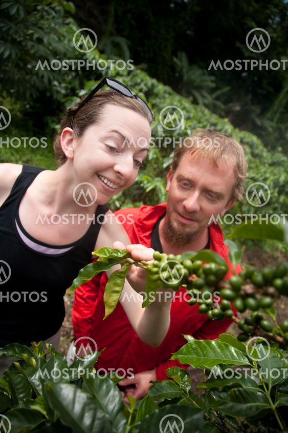 American and European couple on coffee plantation in Costa Rica