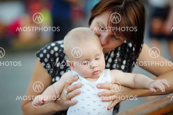 Beautiful woman and her adorable little grandson