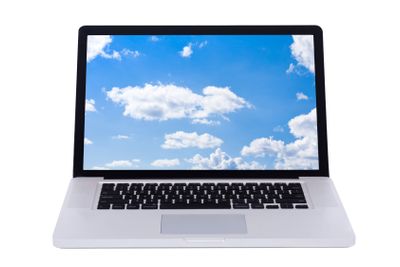 Nature wallpaper displaying in a white laptop screen