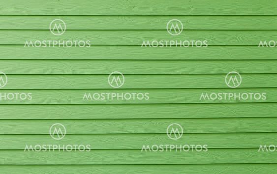 Green color paint plank wall.