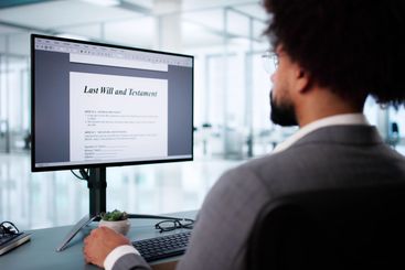 African American man filling out legal documents online