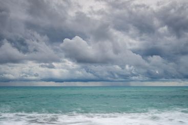 Windy waves crashing on a coast on a stormy day in winter.