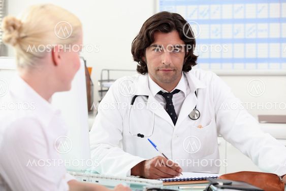 doctor and female patient at surgery