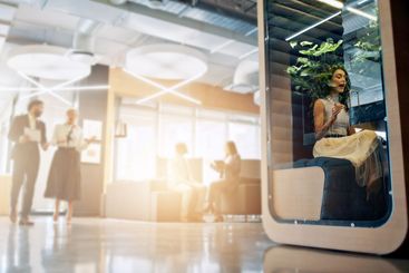 Lobby, meeting and business people with cubicle in...