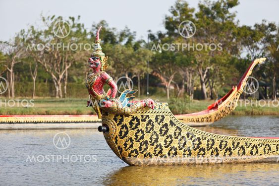 Red ape warship floats in the river