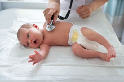 Pediatrician Examining Baby