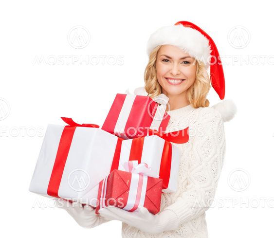 woman in santa helper hat with many gift boxes