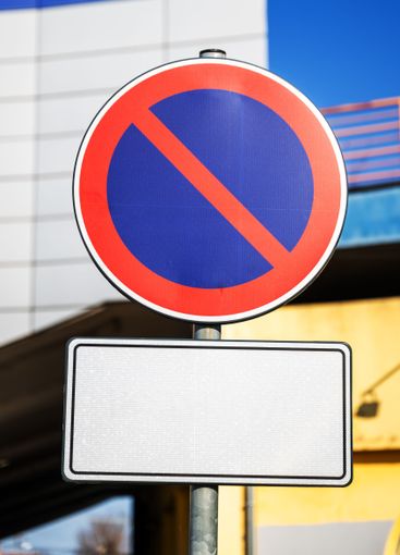 European No Parking traffic sign with information board...