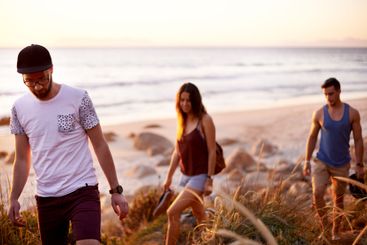 Walking, travel and people by beach for journey, weekend...