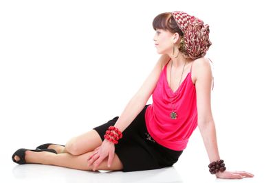 Full length woman in a turban isolated