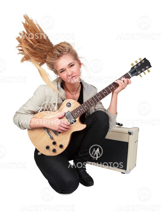 Passionate rock Girl Playing An Electric Guitar