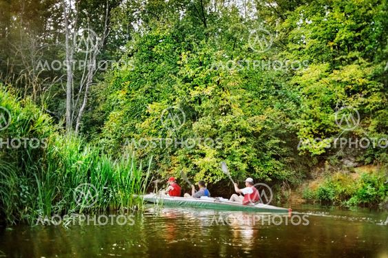 canoening on forest river