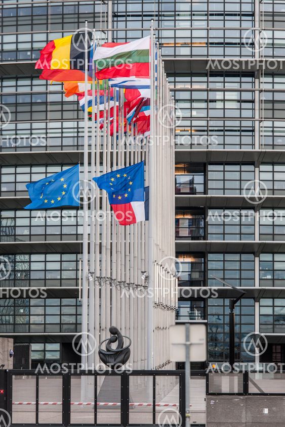 European Union Flags and France flag flies at half-mast