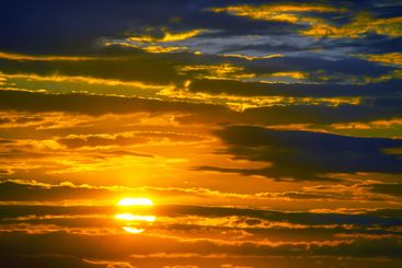 the sky after sunset is adorned with a vibrant mix of...