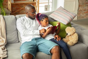 Young african family during quarantine, insulation...