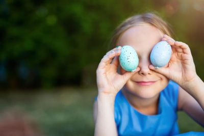 Little girl with Easter eggs