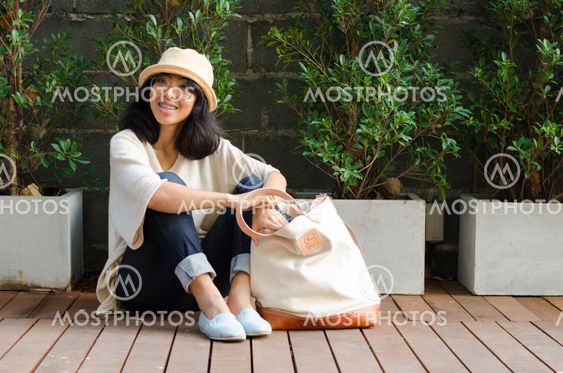 Young woman with a canvas bag