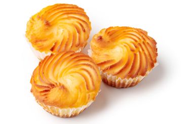 Deliciously baked pastries arranged attractively on a...