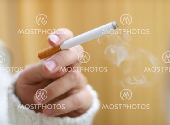 Cigarette in hand