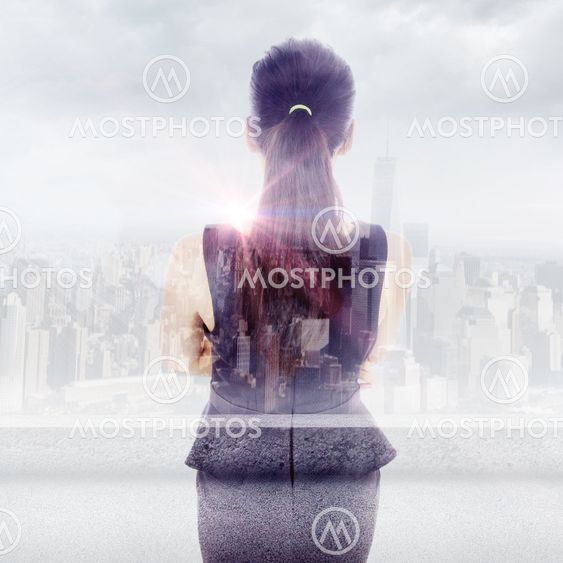 Composite image of standing businesswoman