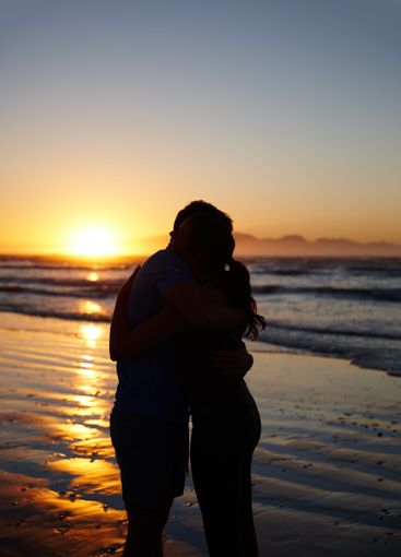 Beach, silhouette and couple with love, hug and travel...