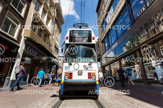Tram on a busy street of Amsterdam