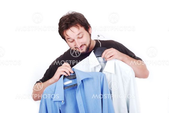 Happy man with two fasioned shirts