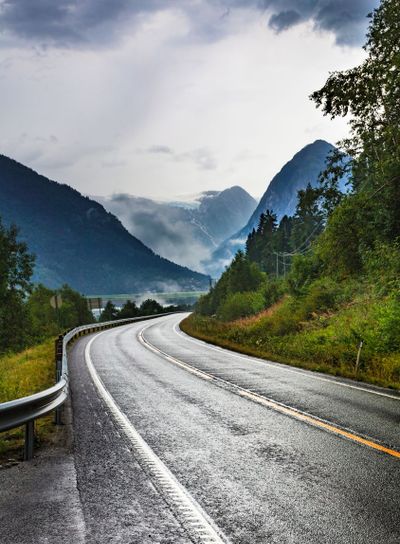 Road and mountains landscape in Norway