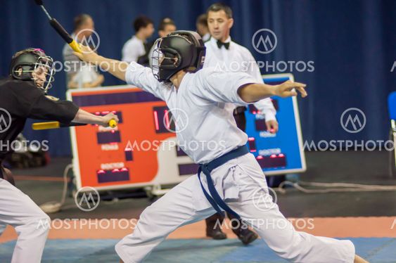 Kobudo competition men with nunchaku