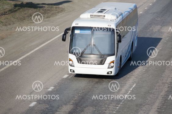 bus goes on country highway