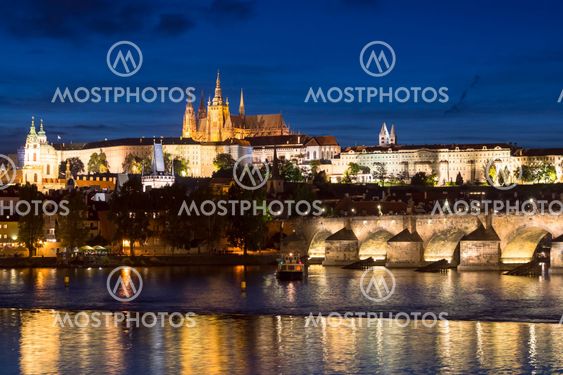 Pargue at dusk, view of the Charles Bridge and Prague...