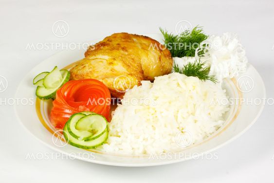 Steamed Garlic chicken and rice on white plate