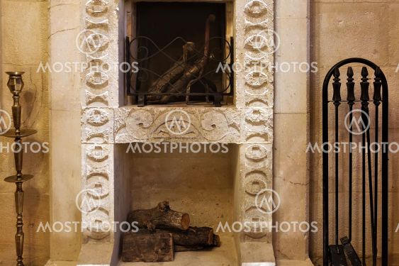 Interior details. The fireplace is made of natural stone