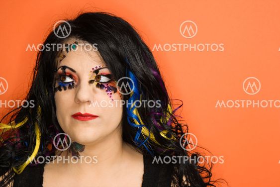 Woman wearing unique makeup.