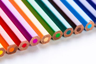 Colorful collection of sharpened colored pencils...