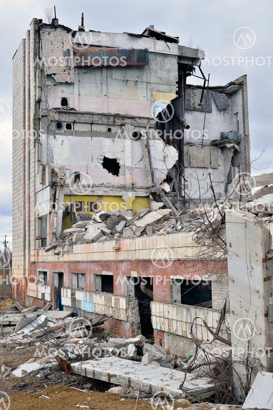 Pieces of Metal and Stone are Crumbling from Demolished Building Floors