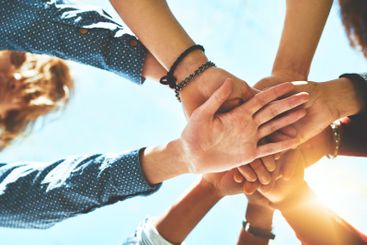 Students, below or hands together in outdoor campus...