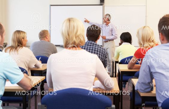 Senior tutor teaching class