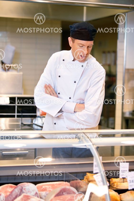Butcher at Meat Counter