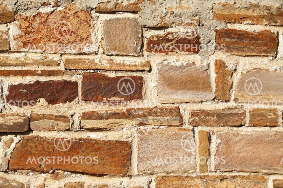 Abstract old colorful stone wall as background