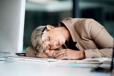 Computer, businesswoman and sleeping in office for...