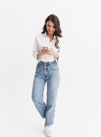 Full length of a beautiful smiling young woman