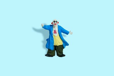 Miniature people toy figure photography. Full body of a...