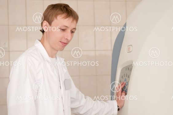 Doctor with CT scan films